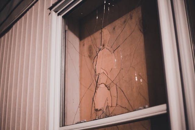Close-Up Shot of a Broken Window